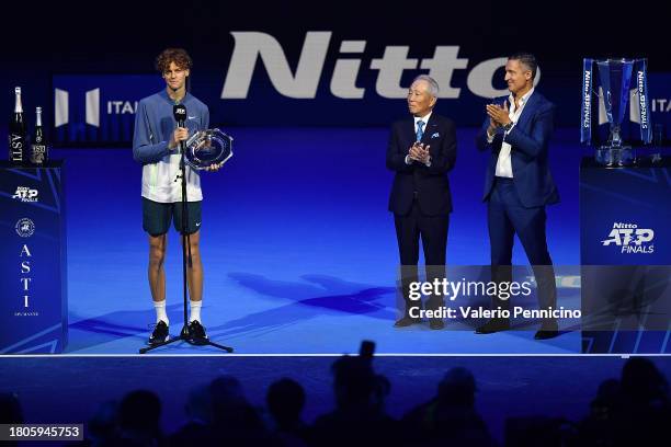 Jannik Sinner of Italy speaks after defeat against Novak Djokovic of Serbia in the Men's Singles Finals between Jannik Sinner of Italy and Novak...