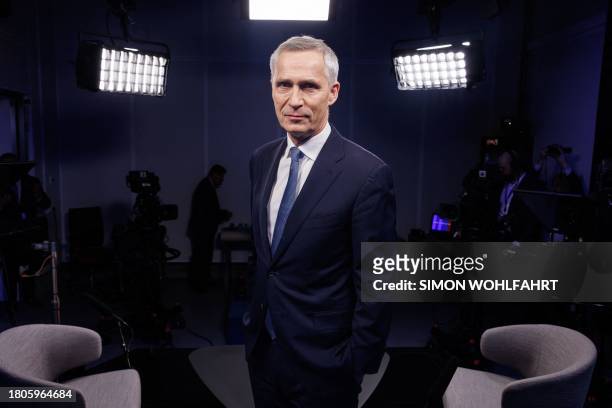 Secretary General of NATO Jens Stoltenberg poses for a picture ahead of an interview with AFP at the NATO headquarters in Brussels, on November 27,...