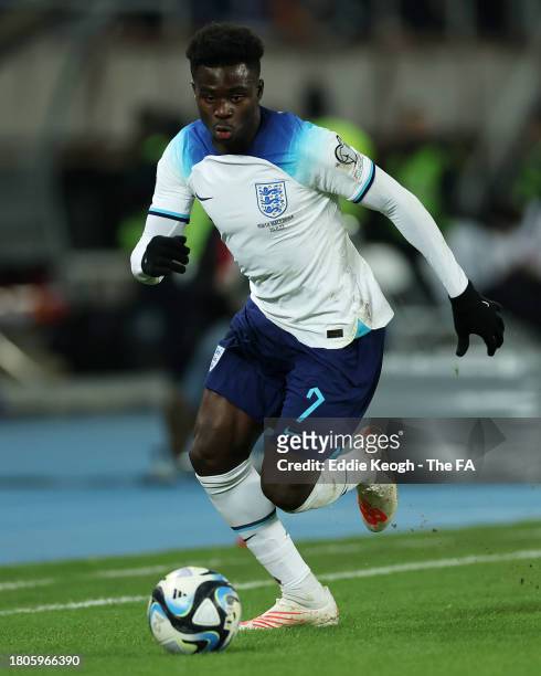 Bukayo Saka of England runs with the ball during the UEFA EURO 2024 European qualifier match between North Macedonia and England at National Arena...