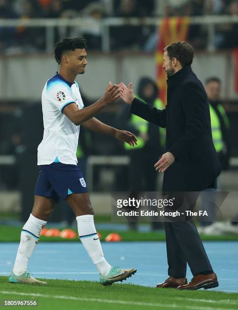Ollie Watkins of England shakes hands with Gareth Southgate, Head Coach of England, during the UEFA EURO 2024 European qualifier match between North...