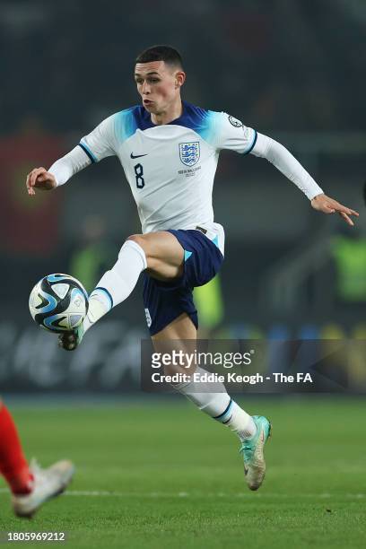 Phil Foden of England controls the ball during the UEFA EURO 2024 European qualifier match between North Macedonia and England at National Arena...