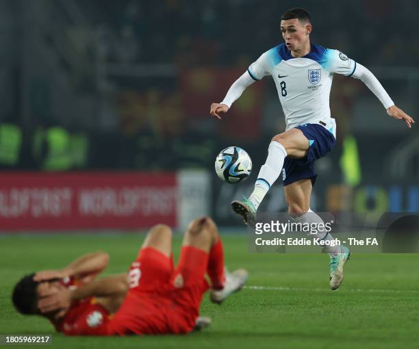Phil Foden of England controls the ball during the UEFA EURO 2024 European qualifier match between North Macedonia and England at National Arena...