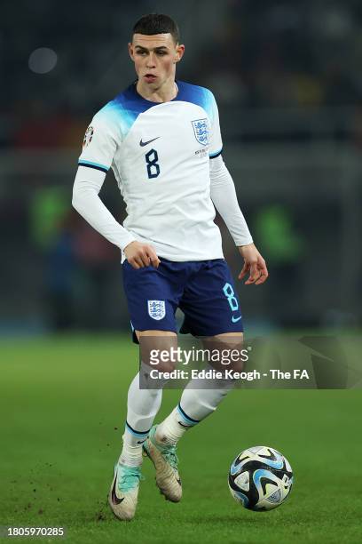 Phil Foden of England runs with the ball during the UEFA EURO 2024 European qualifier match between North Macedonia and England at National Arena...