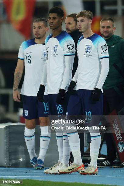 Kalvin Phillips, Marcus Rashford and Cole Palmer of England prepare to enter the pitch as substitutes during the UEFA EURO 2024 European qualifier...
