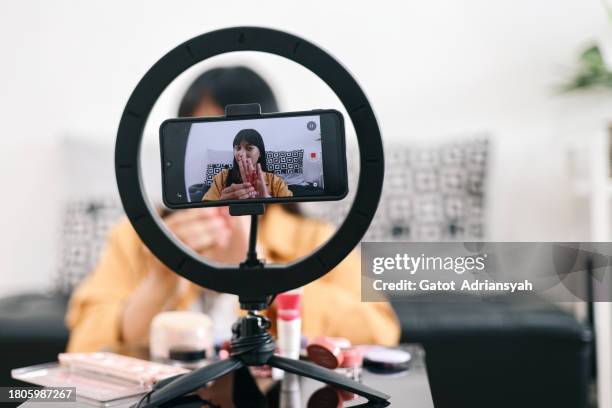 side hustle - beauty vlogger live streaming - content creation stock pictures, royalty-free photos & images