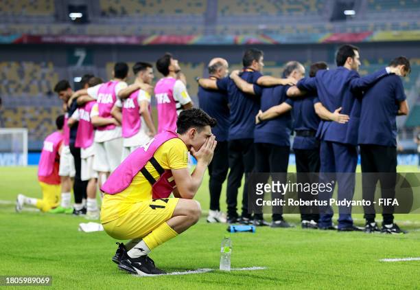 Mohammadhossein Sharifi of IR Iran looks dejected during the penalty shootout in the FIFA U-17 World Cup Round of 16 match between Morocco and IR...