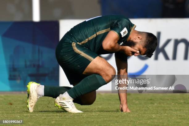 Mamoon Moosa Khan of Pakistan gets hits on his face during the 2026 FIFA World Cup AFC Qualifier Group G match between Pakistan and Tajikistan at...