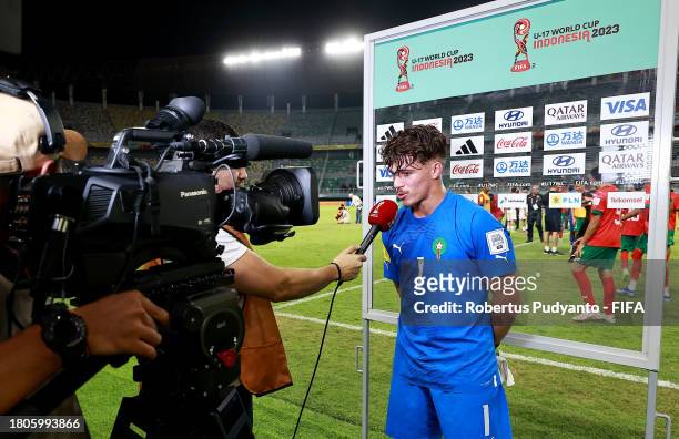 Taha Benrhozil of Morocco is interviewed after their victory in the FIFA U-17 World Cup Round of 16 match between Morocco and IR Iran at Gelora Bung...