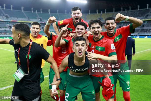 Players of Morocco celebrate after the FIFA U-17 World Cup Round of 16 match between Morocco and IR Iran at Gelora Bung Tomo Stadium on November 21,...