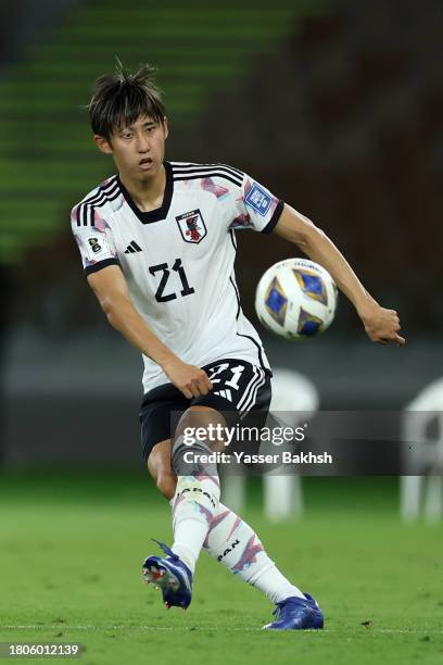 Hiroki Ito of Japan makes a pass during the FIFA World Cup Asian 2nd qualifier match between Syria and Japan at Prince Abdullah Al Faisal Stadium on...