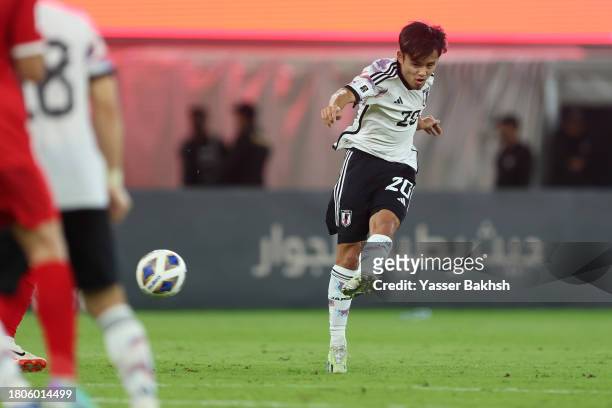 Takefusa Kubo of Japan scores the team's first goal during the FIFA World Cup Asian 2nd qualifier match between Syria and Japan at Prince Abdullah Al...