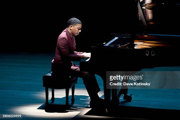 Christian Sands performs onstage at Lincoln Center's Fall Gala honoring James G. Dinan at David Geffen Hall on November 20, 2023 in New York City.