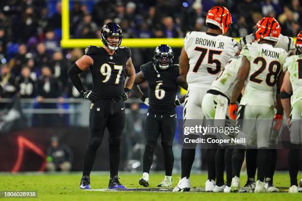 Brent Urban of the Baltimore Ravens looks on from the field during an NFL football game against the Cincinnati Bengals at M&T Bank Stadium on...