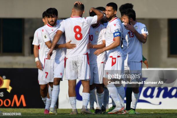 Tajikistan players celebrate the 6th goal during the 2026 FIFA World Cup AFC Qualifier Group G match between Pakistan and Tajikistan at Jinnah Sports...