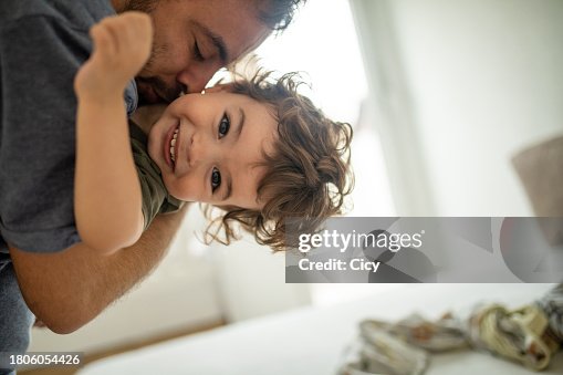 Young father and his toddler having the time of their lives Young father and his toddler having the time of their lives