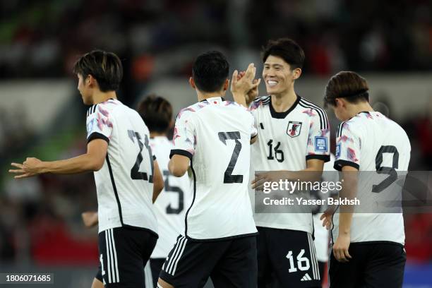 Yukinari Sugawara of Japan celebrates with team mates after scoring the team's fourth goal during the FIFA World Cup Asian 2nd qualifier match...