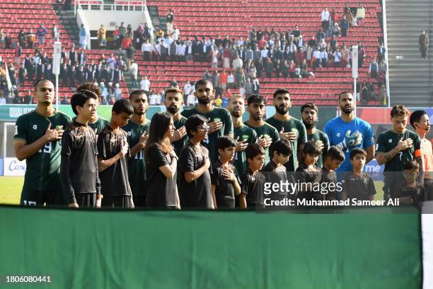 Pakistan players stand for their national anthem prior to the 2026 FIFA World Cup AFC Qualifier Group G match between Pakistan and Tajikistan at...