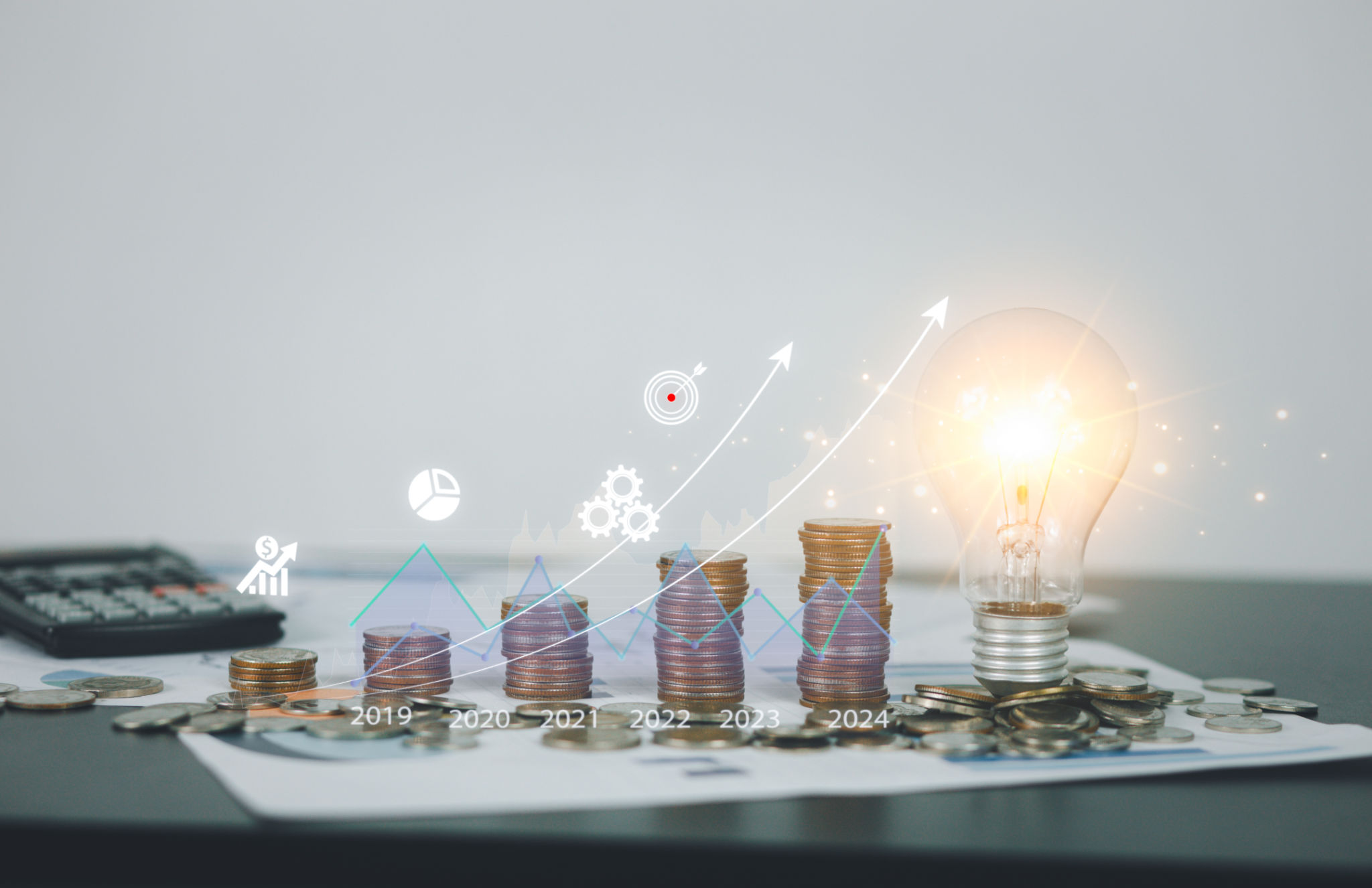 Stack of coins with glowing light bulbs and candlestick chart market chart Innovation financial development and investment grow, crypto to the development of e-commerce management for future success. Stack of coins with glowing light bulbs and candlestick chart market chart Innovation financial development and investment grow, crypto to the development of e-commerce management for future success.