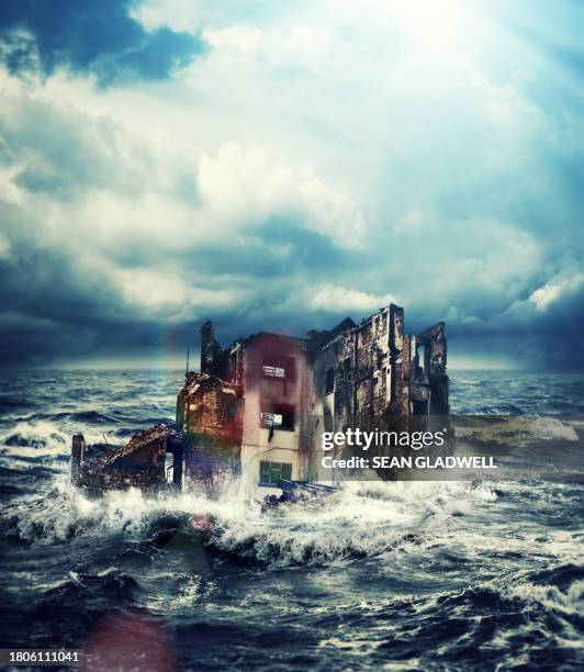 building in ocean - tsunami house stock pictures, royalty-free photos & images