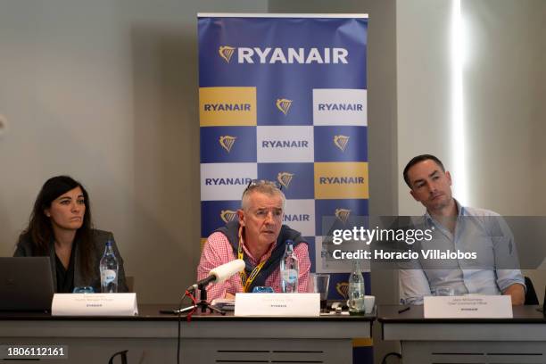 Ryanair Group CEO Michael O'Leary is accompanied by Ryanair Country Officer Portugal Elena Cabrera and CCO Jason McGuinness while listening to a...