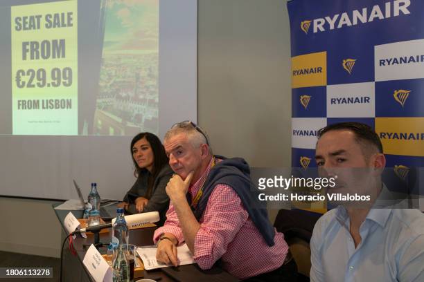 Ryanair Group CEO Michael O'Leary is accompanied by Ryanair Country Officer Portugal Elena Cabrera and CCO Jason McGuinness while listening to a...