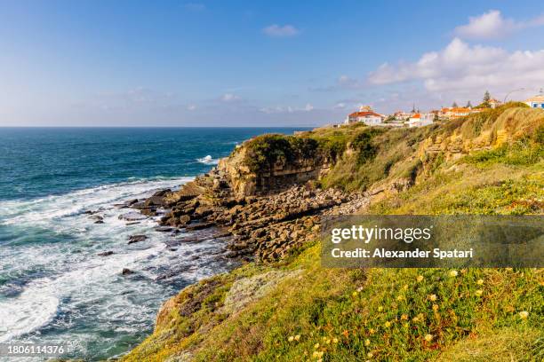 coastline by the ocean in azenhas do mar village, sintra, portugal - azenhas do mar imagens e fotografias de stock