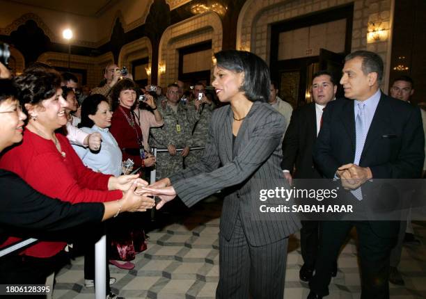 Secretary of State Condoleezza Rice is greeted by the US embassy staff in Baghdad, 17 February 2007. On an unannounced visit to Iraq today, Rice said...