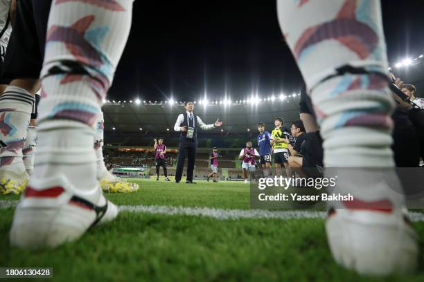 Hajime Moriyasu, Head Coach of Japan, speaks to his players after the FIFA World Cup Asian 2nd qualifier match between Syria and Japan at Prince...