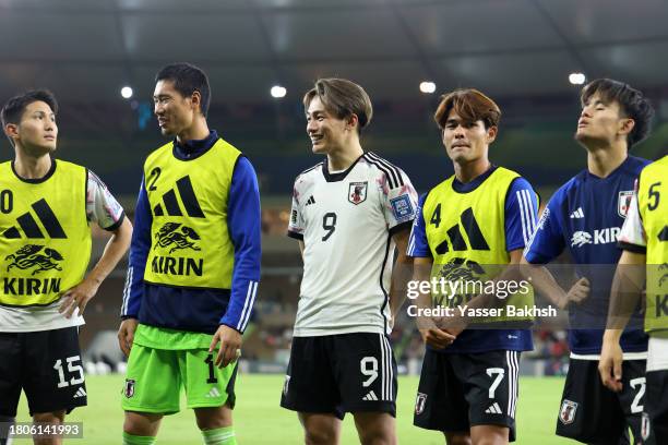 Daiya Maekawa, Ayase Ueda and Kaishu Sano of Japan applaud the fans after the FIFA World Cup Asian 2nd qualifier match between Syria and Japan at...