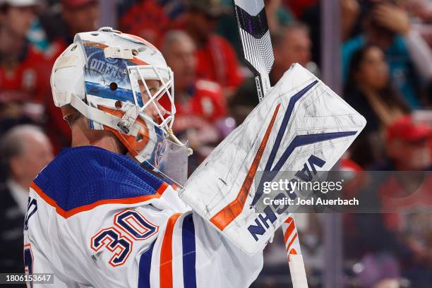 Goaltender Calvin Pickard of the Edmonton Oilers looks up ice during a break in action against the Florida Panthers at the Amerant Bank Arena on...