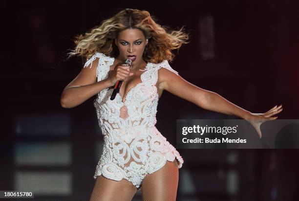 Singer Beyonce performs on stage during a concert in the Rock in Rio Festival on September 13, 2013 in Rio de Janeiro, Brazil.