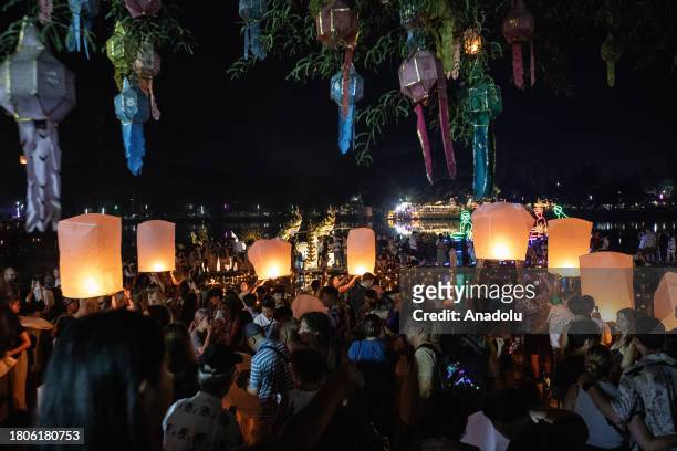People release lanterns during Yi Peng Festival & Loy Kratong in Doi Saket district of Chiang Mai, Thailand on November 27, 2023. In the north of...
