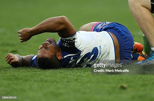 Ben Barba of the Bulldogs lies on the ground in pain after injuring his leg during the NRL Grand Final match between the Canterbury Bulldogs and the...