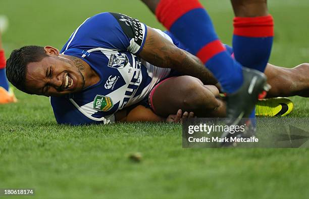 Ben Barba of the Bulldogs lies on the ground in pain after injuring his leg during the NRL Grand Final match between the Canterbury Bulldogs and the...