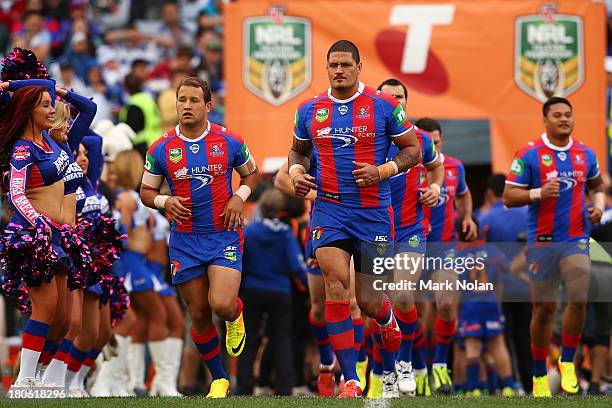 Willie Mason and Knights team mates runs onto the field during the NRL Elimination Final match between the Canterbury Bulldogs and the Newcastle...