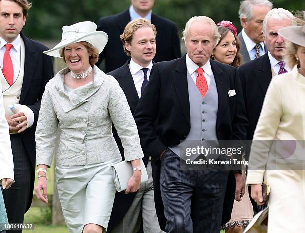 Lady Sarah McCorquodale and Neil McCorquodale attend the wedding of James Meade and Lady Laura Marsham at The Parish Church of St. Nicholas Gayton on...