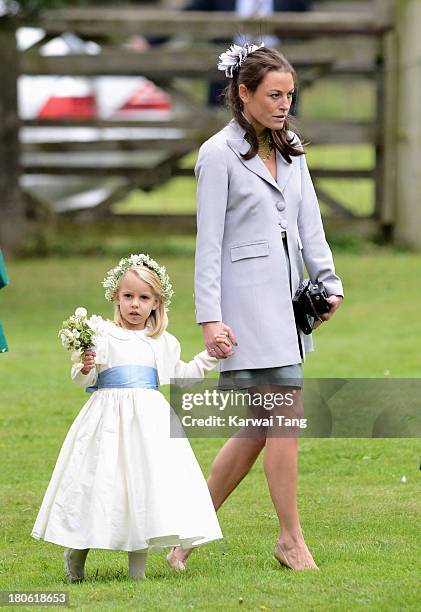 Jecca Craig attends the wedding of James Meade and Lady Laura Marsham at The Parish Church of St. Nicholas Gayton on September 14, 2013 in King's...