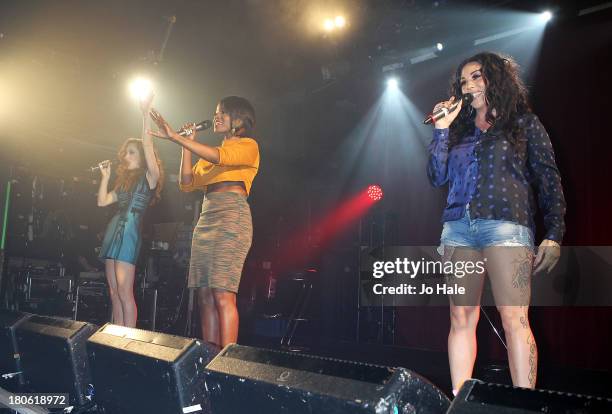 Siobhan Donaghy, Keisha Buchanan and Mutya Buena perform on stage at G-A-Y on September 14, 2013 in London, England.