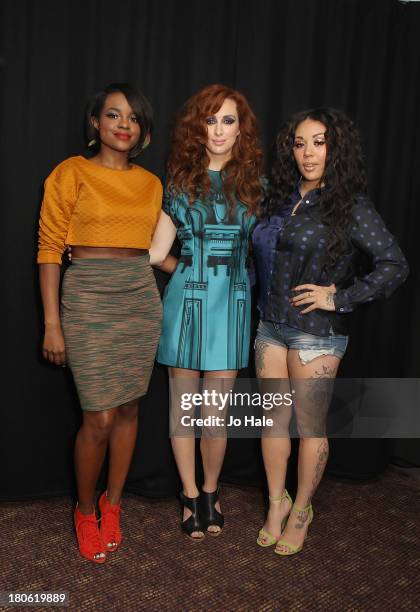 Keisha Buchanan, Siobhan Donaghy and Mutya Buena pose backstage at G-A-Y on September 14, 2013 in London, England.