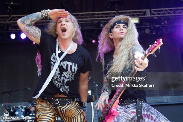 Vocalist Michael Starr and bassist Lexi Foxx of Steel Panther perform in Monster Energy's Aftershock Festival at Discovery Park on September 14, 2013...