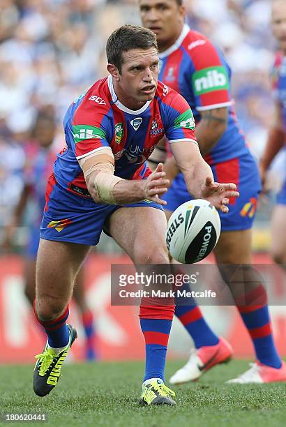 Danny Buderus of the Knights passes during the NRL Elimination Final match between the Canterbury Bulldogs and the Newcastle Knights at ANZ Stadium...