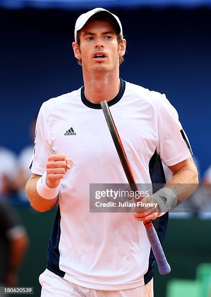 Andy Murray of Great Britain celebrates winning a game against Ivan Dodig of Croatia during day three of the Davis Cup World Group play-off tie...