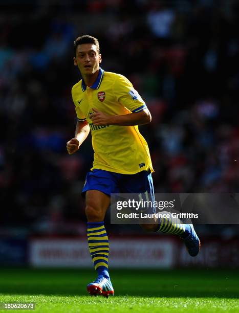 Mesut Ozil of Arsenal during the Barclays Premier League match between Sunderland and Arsenal at Stadium of Light on September 14, 2013 in...