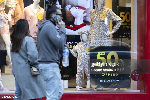 Stores put up advertisements on the windows for the shopping spree of ''Black Friday'' in London, United Kingdom on November 27, 2023. The...