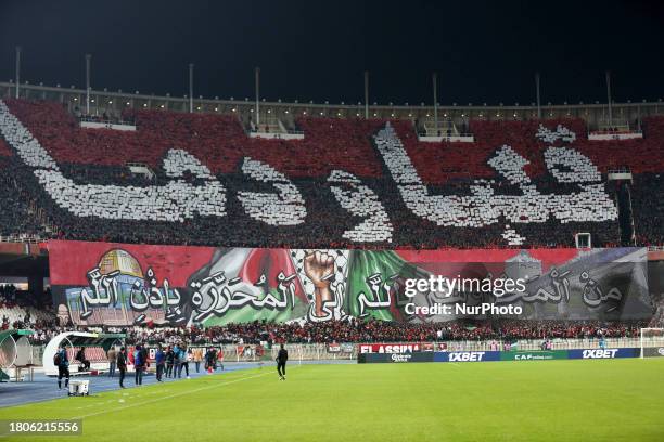 Alger fans are applauding the team during the 23/24 African Confederation Cup football match between USM Alger of Algeria and Al Hilal Benghazi of...