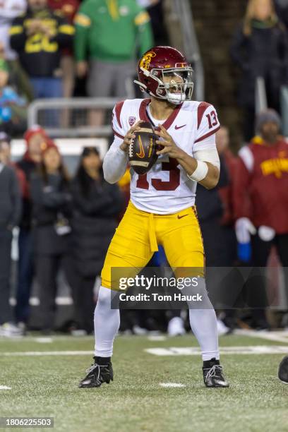 Quarterback Caleb Williams of the USC Trojans passes the ball during their game against the Oregon Ducks at Autzen Stadium on November 11, 2023 in...