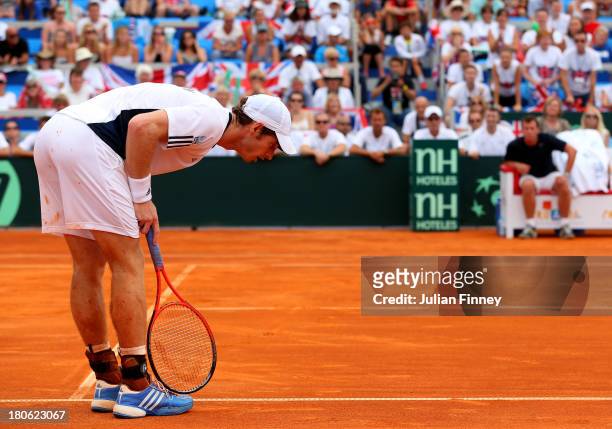 Andy Murray of Great Britain checks a line call against Ivan Dodig of Croatia during day three of the Davis Cup World Group play-off tie between...