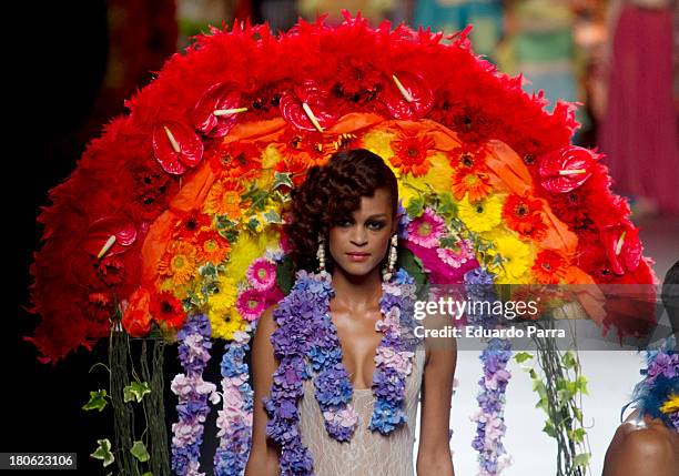 Model showcases designs by Francis Montesinos on the runway at Francis Montesinos show during Mercedes Benz Fashion Week Madrid Spring/Summer 2014 at...