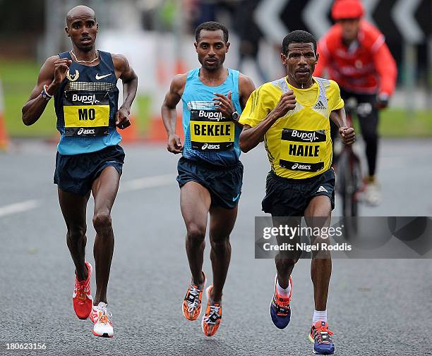 Kenenisa Bekele , Haile Gebrselassie and Mo Farah race during the Great North Run on September 15, 2013 in Gateshead, England.