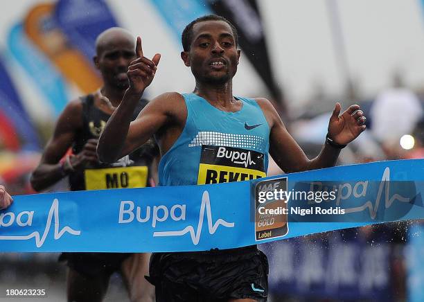 Kenenisa Bekele of Ethiopia reacts after winning the Great North Run on September 15, 2013 in Gateshead, England.